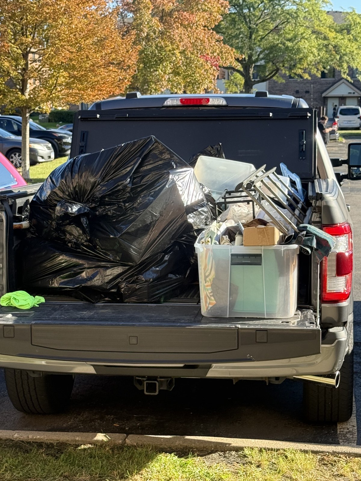 Truck loaded with bags and household items removed during cleanup